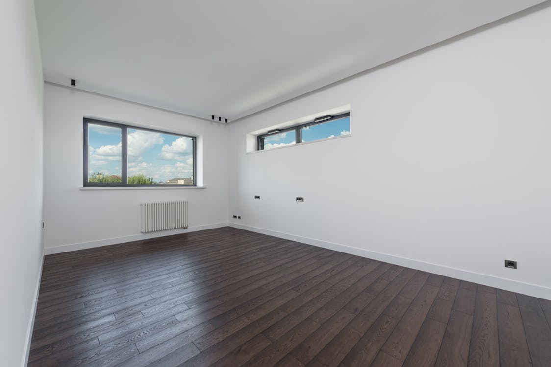 Glad Pleisterwerk Tilburg — eindresultaat: strakke witte wanden en plafond