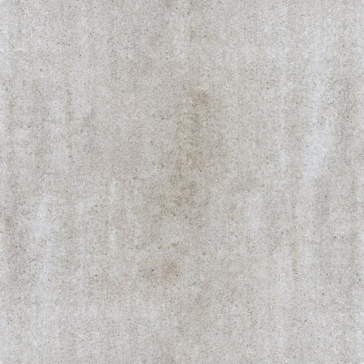 Glad afgewerkt betonoppervlak met warme verlichting als voorbeeld van beton ciré decoratieve afwerking
